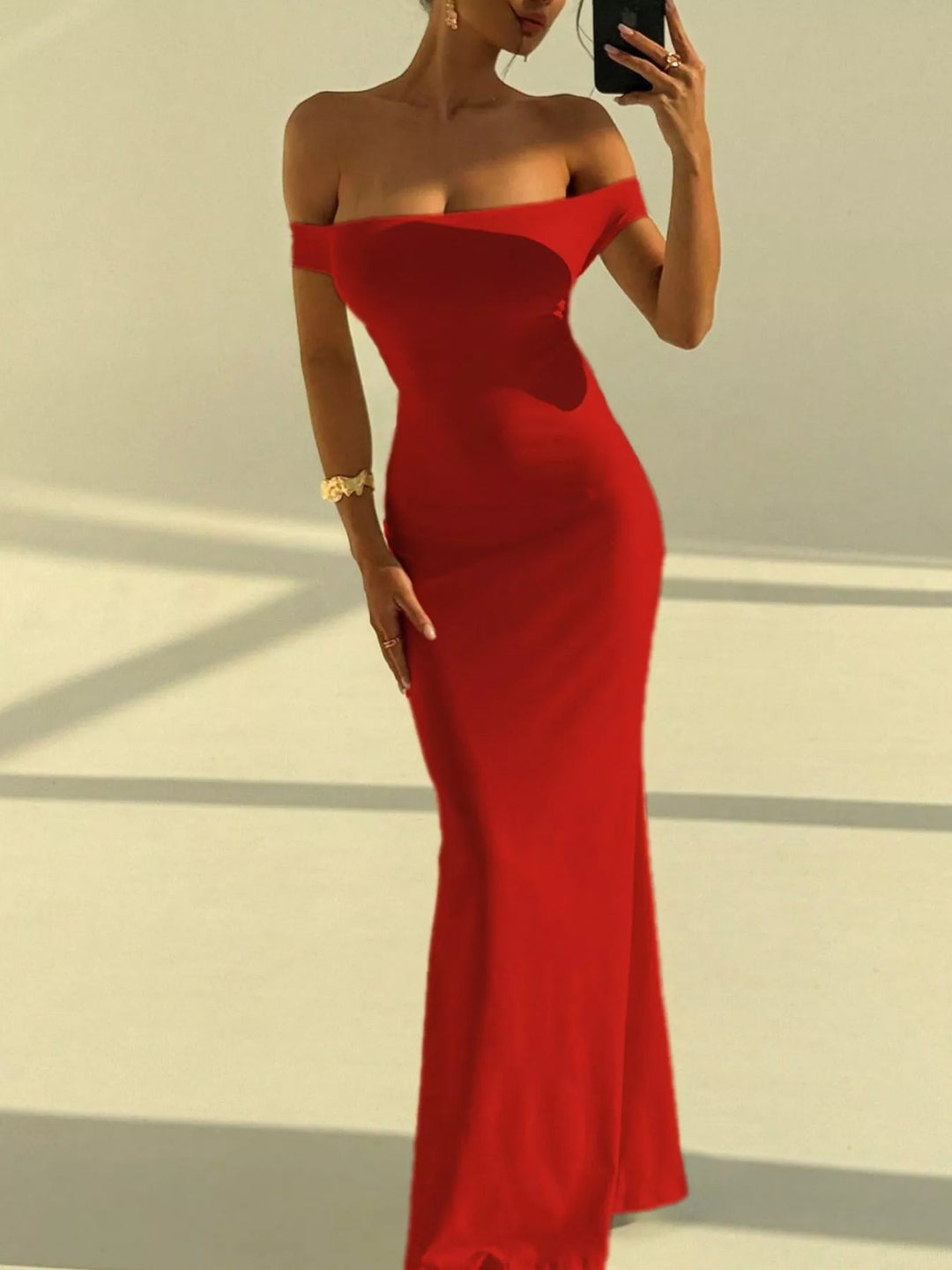 Backless Off-Shoulder Mermaid Dress featuring open back detail, fitted bodycon silhouette, elegant off-shoulder neckline, and floor-length flared hem.