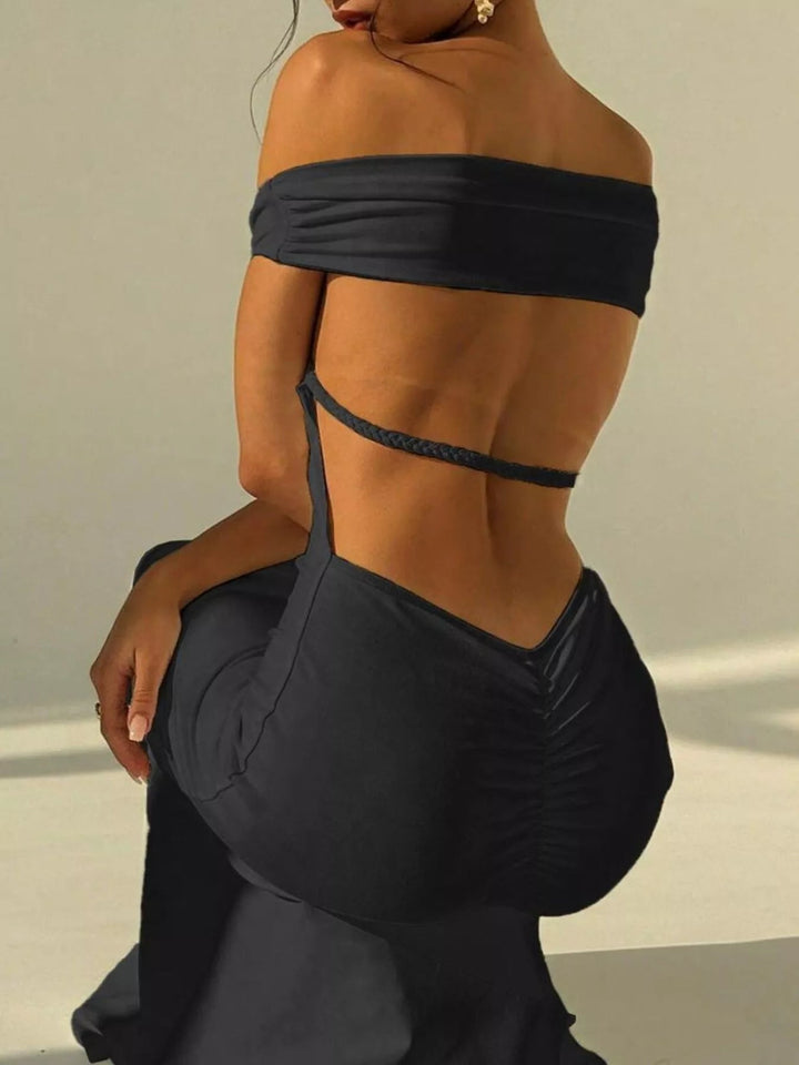 Backless Off-Shoulder Mermaid Dress featuring open back detail, fitted bodycon silhouette, elegant off-shoulder neckline, and floor-length flared hem.
