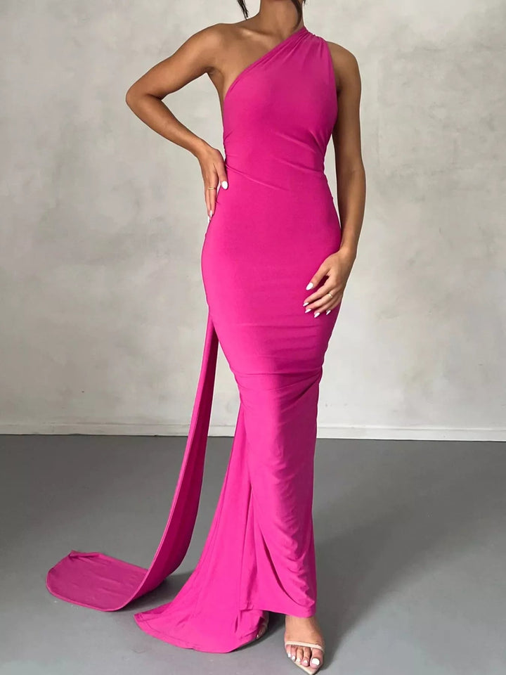 Backless One-Shoulder Bodycon Dress with ruched detailing, asymmetrical neckline, open back design, and elegant floor-length fitted silhouette.