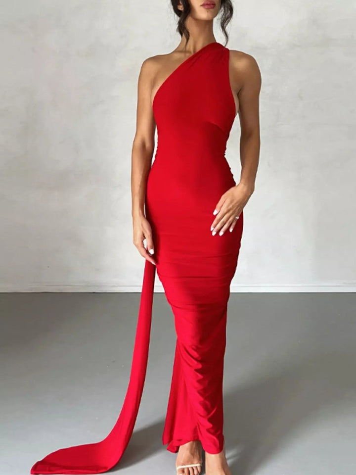 Backless One-Shoulder Bodycon Dress with ruched detailing, asymmetrical neckline, open back design, and elegant floor-length fitted silhouette.