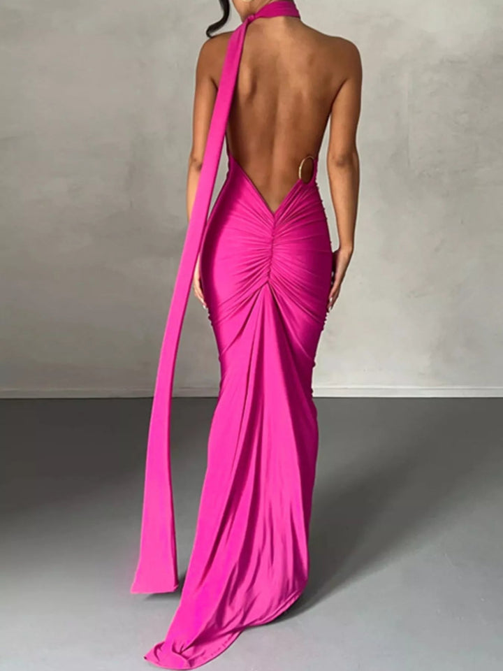 Backless One-Shoulder Bodycon Dress with ruched detailing, asymmetrical neckline, open back design, and elegant floor-length fitted silhouette.