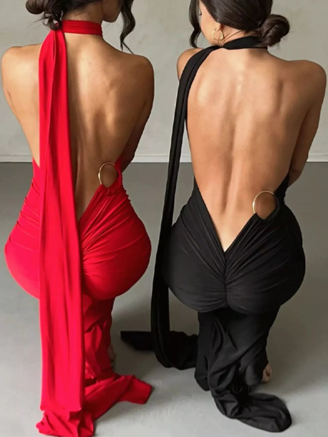 Backless One-Shoulder Bodycon Dress with ruched detailing, asymmetrical neckline, open back design, and elegant floor-length fitted silhouette.