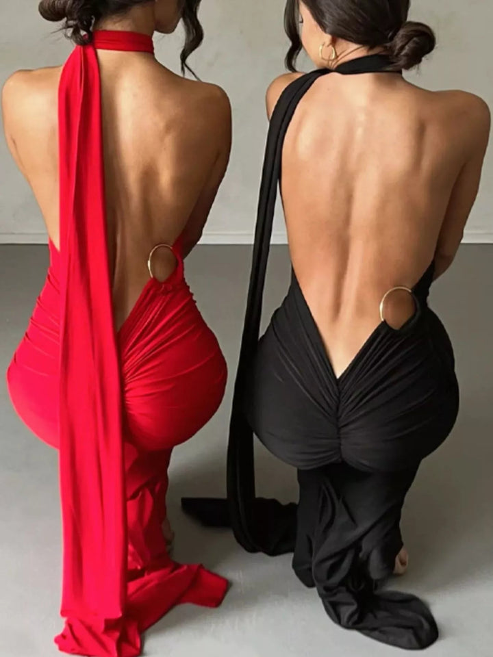 Backless One-Shoulder Bodycon Dress with ruched detailing, asymmetrical neckline, open back design, and elegant floor-length fitted silhouette.
