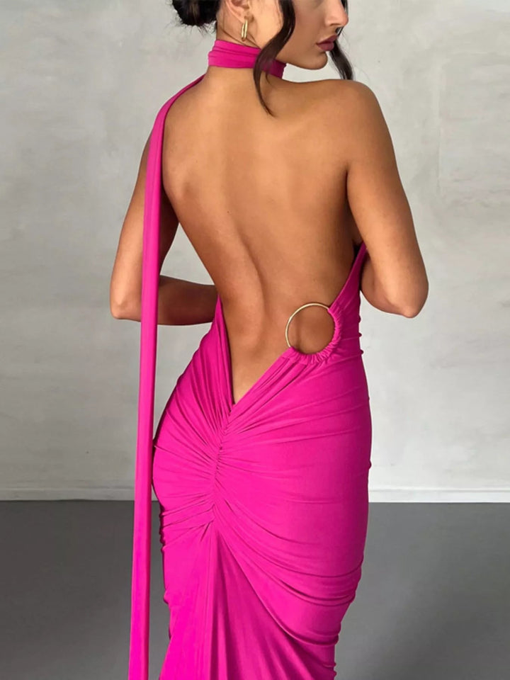Backless One-Shoulder Bodycon Dress with ruched detailing, asymmetrical neckline, open back design, and elegant floor-length fitted silhouette.