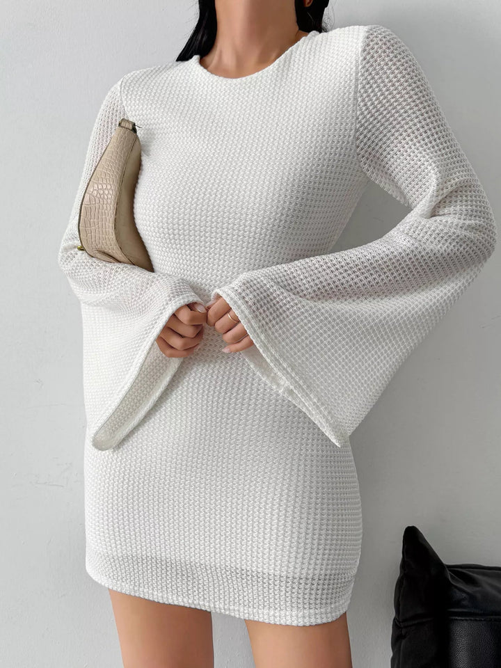 Backless Waffle Knit Dress with textured waffle fabric, flare sleeves, tied open back detail, and flattering mini length silhouette.
