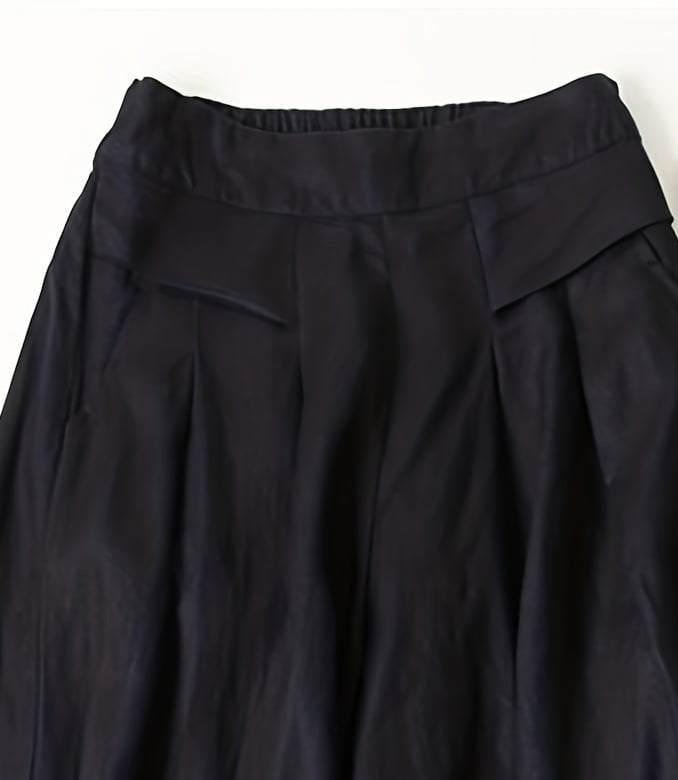 Women’s high waist wide-leg pants in solid black with elastic waistband and pockets, casual all-season trousers