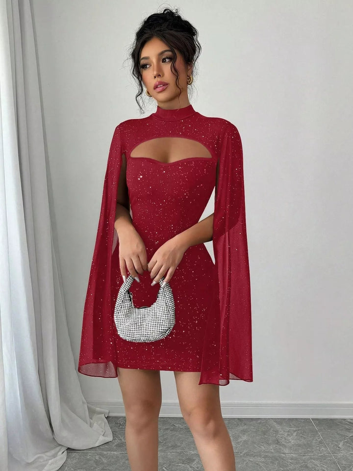 Glitter Cape Sleeve Mini Dress featuring shimmering fabric, elegant cape sleeves, subtle front cutout detail, and fitted bodycon mini silhouette.