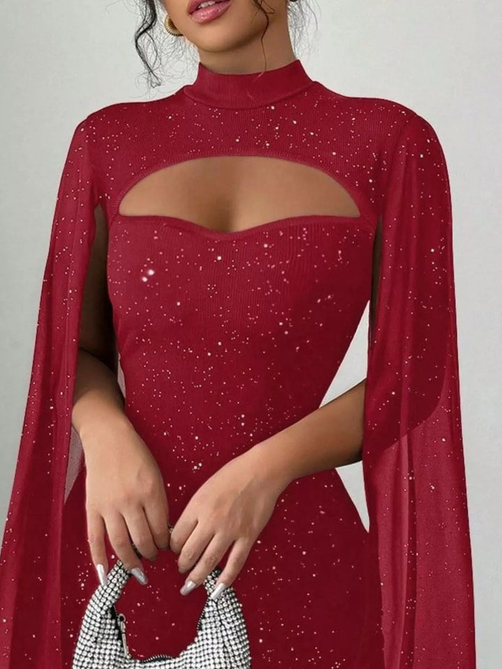 Glitter Cape Sleeve Mini Dress featuring shimmering fabric, elegant cape sleeves, subtle front cutout detail, and fitted bodycon mini silhouette.