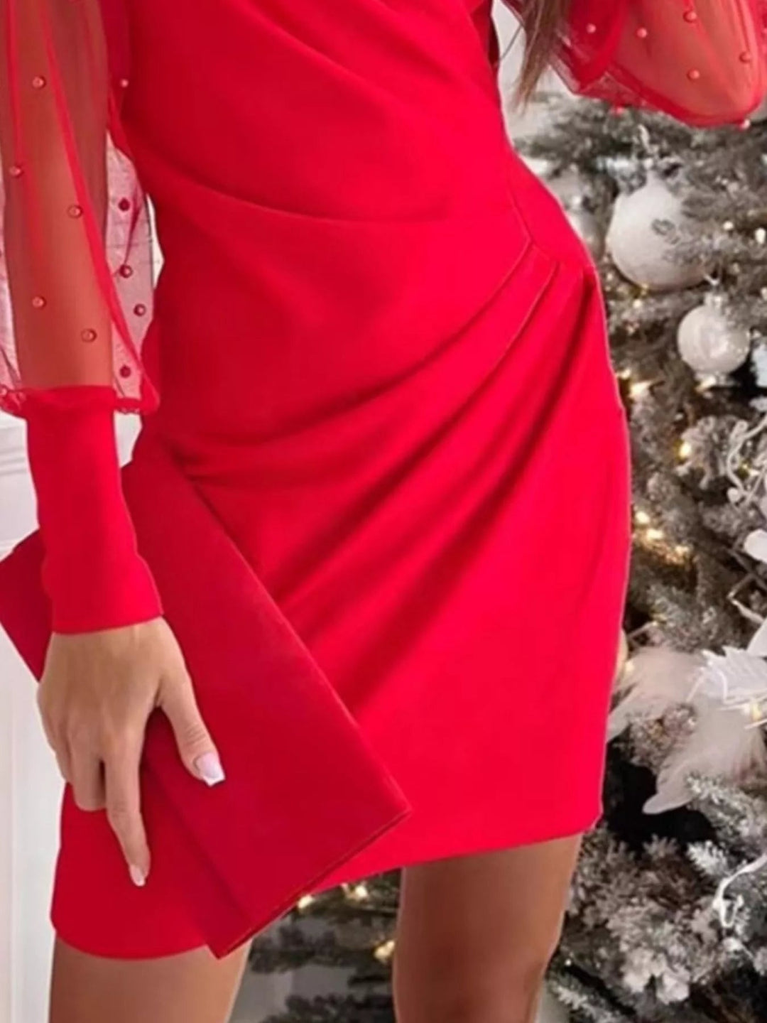 Floral Applique Bodycon Dress with sheer mesh sleeves, ruched detailing, delicate floral appliqué accents, and fitted curve-enhancing silhouette.
