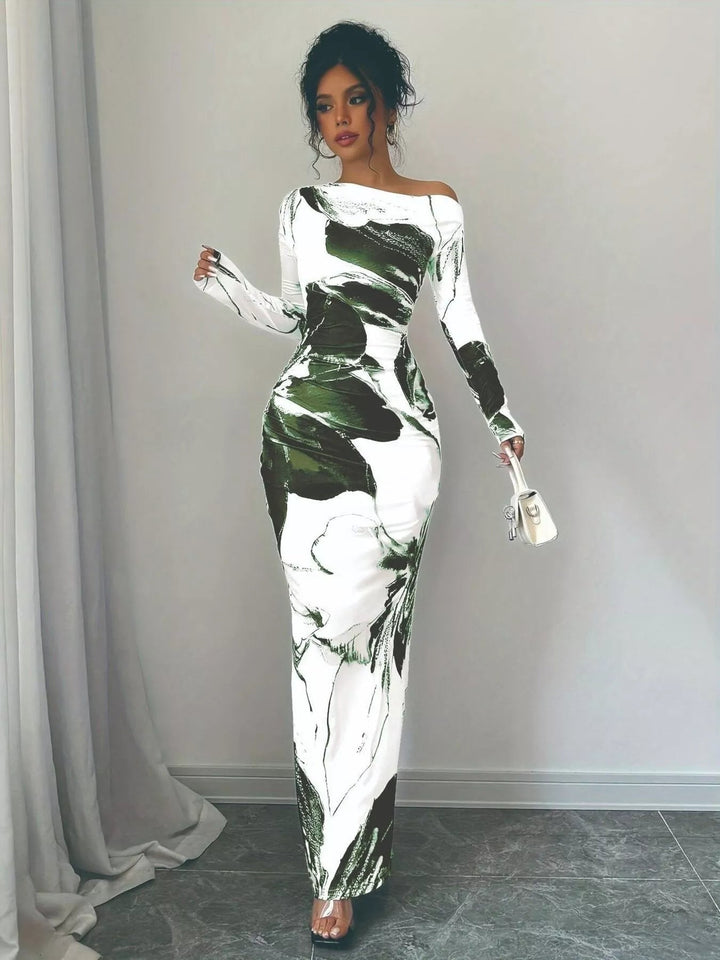 Floral One Shoulder Maxi dress with asymmetrical neckline, ruched waist detail, soft stretch fabric, flowing maxi length, and elegant floral print.