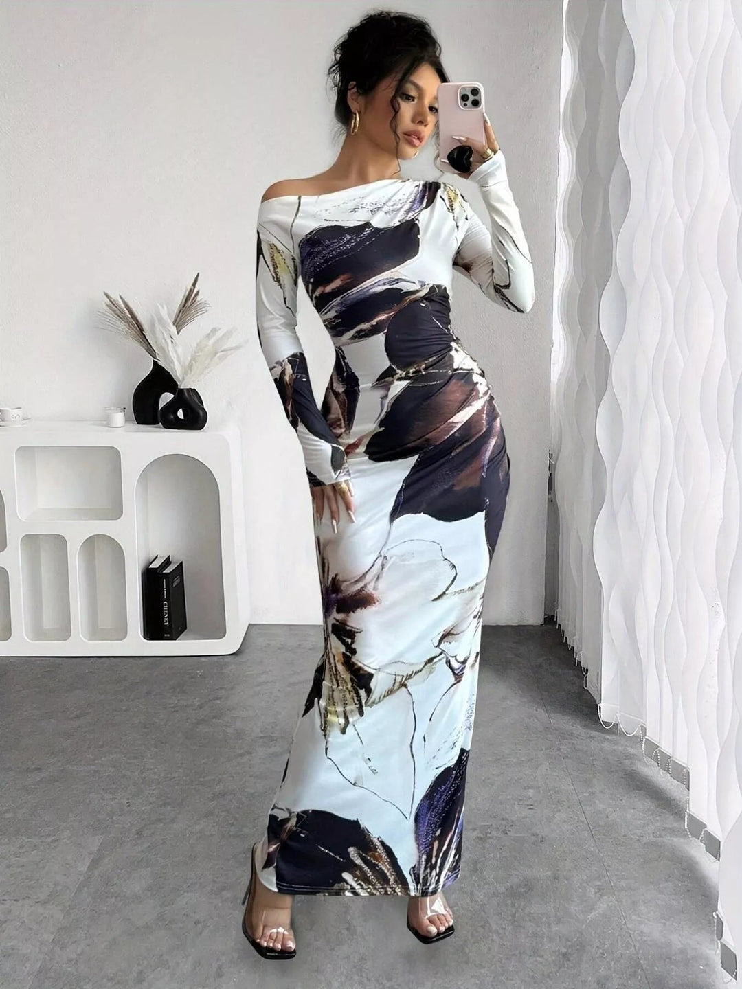 Floral One Shoulder Maxi dress with asymmetrical neckline, ruched waist detail, soft stretch fabric, flowing maxi length, and elegant floral print.