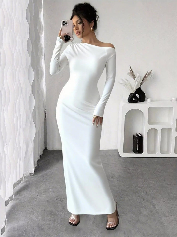 Floral One Shoulder Maxi dress with asymmetrical neckline, ruched waist detail, soft stretch fabric, flowing maxi length, and elegant floral print.