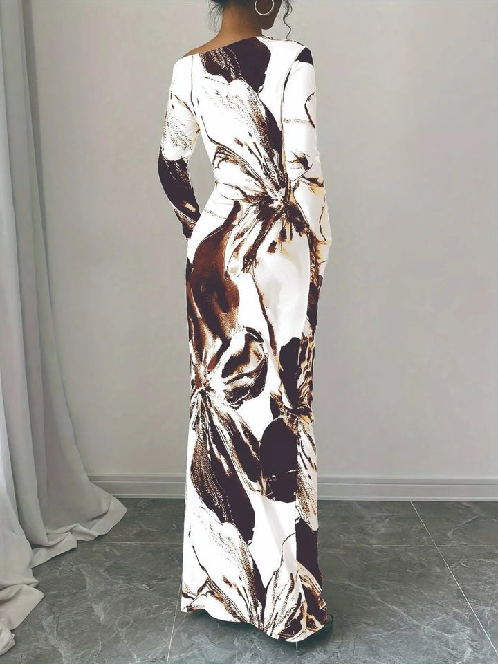 Floral One Shoulder Maxi dress with asymmetrical neckline, ruched waist detail, soft stretch fabric, flowing maxi length, and elegant floral print.