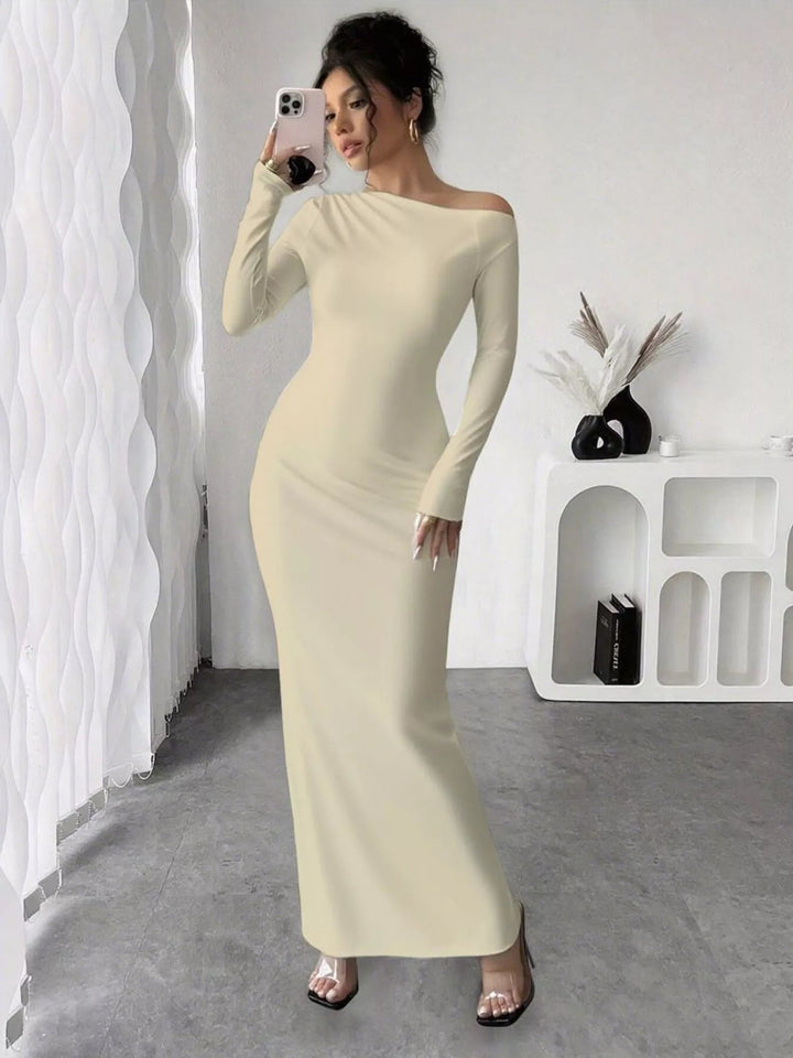 Floral One Shoulder Maxi dress with asymmetrical neckline, ruched waist detail, soft stretch fabric, flowing maxi length, and elegant floral print.