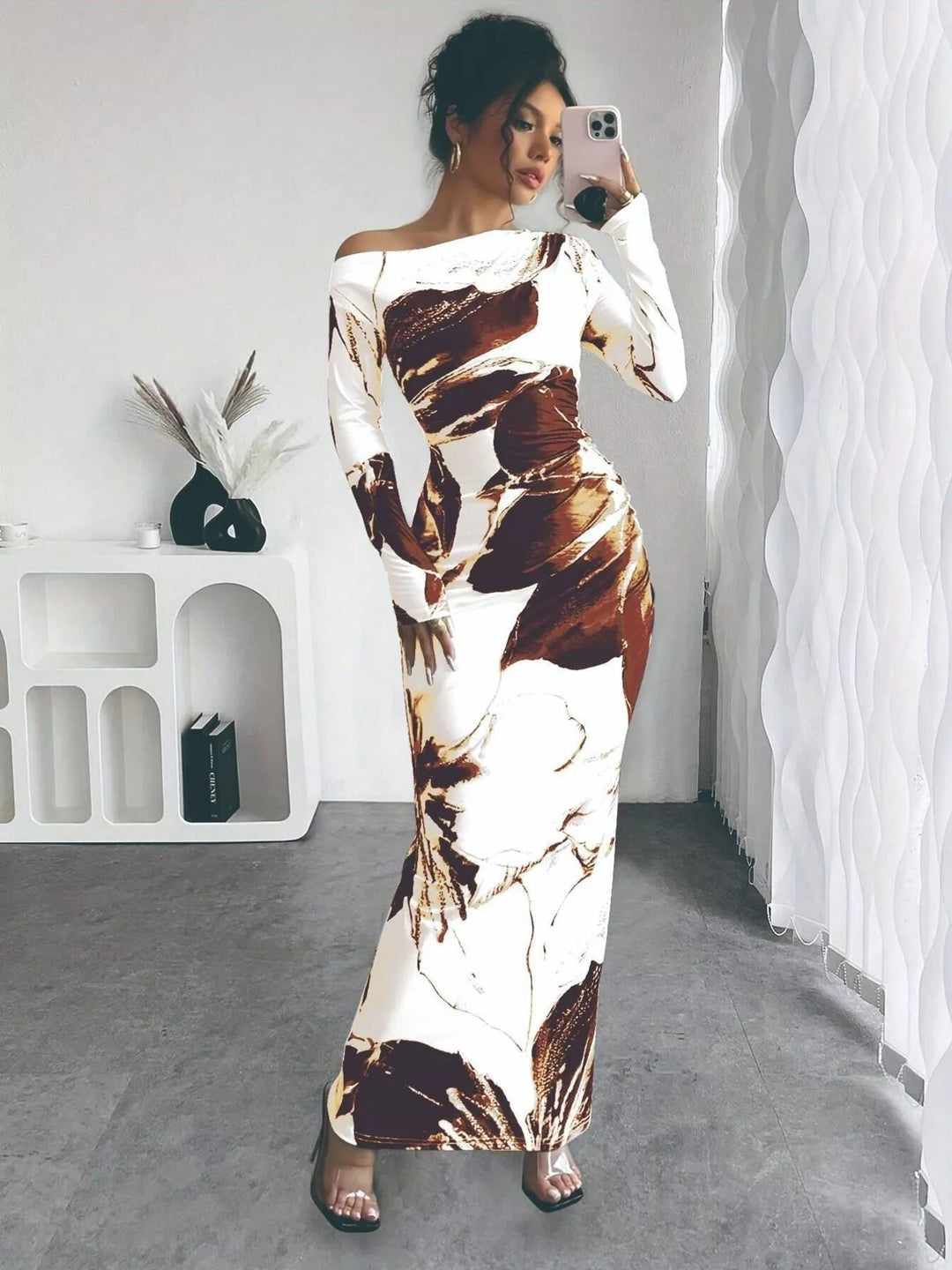 Floral One Shoulder Maxi dress with asymmetrical neckline, ruched waist detail, soft stretch fabric, flowing maxi length, and elegant floral print.