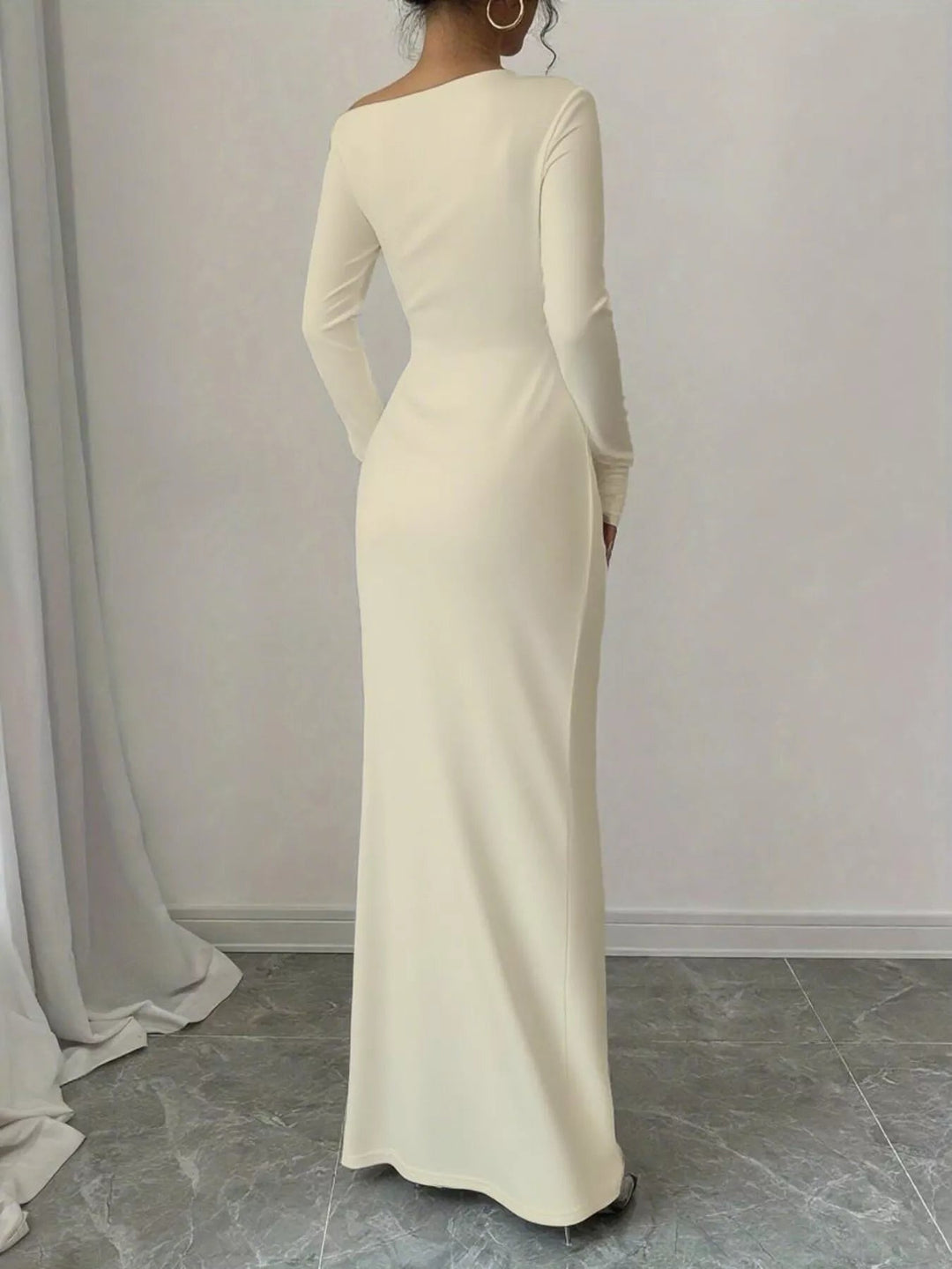 Floral One Shoulder Maxi dress with asymmetrical neckline, ruched waist detail, soft stretch fabric, flowing maxi length, and elegant floral print.