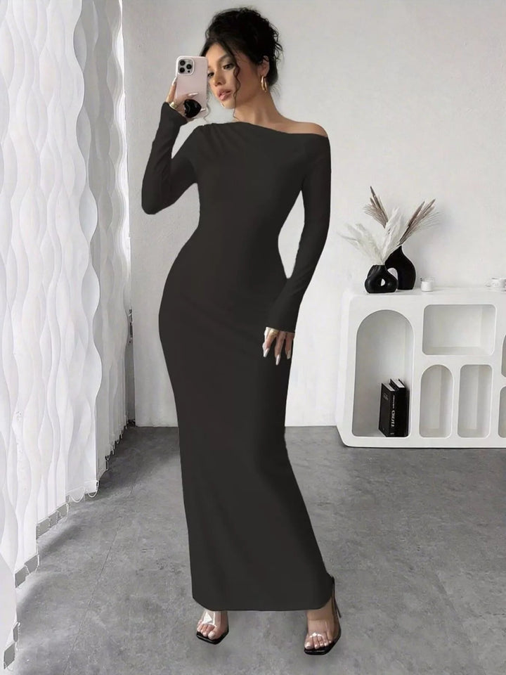 Floral One Shoulder Maxi dress with asymmetrical neckline, ruched waist detail, soft stretch fabric, flowing maxi length, and elegant floral print.