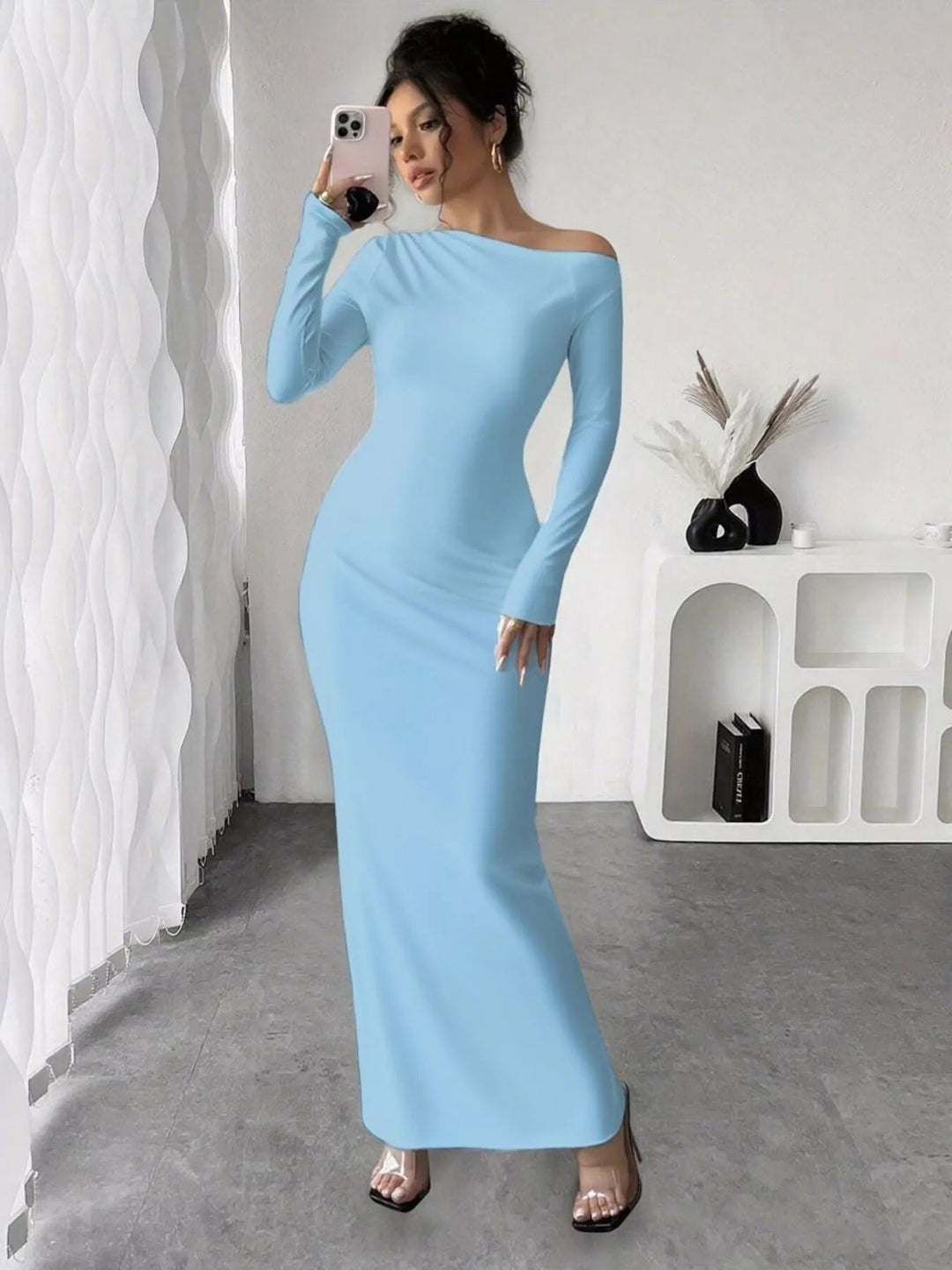 Floral One Shoulder Maxi dress with asymmetrical neckline, ruched waist detail, soft stretch fabric, flowing maxi length, and elegant floral print.