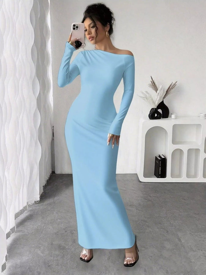 Floral One Shoulder Maxi dress with asymmetrical neckline, ruched waist detail, soft stretch fabric, flowing maxi length, and elegant floral print.