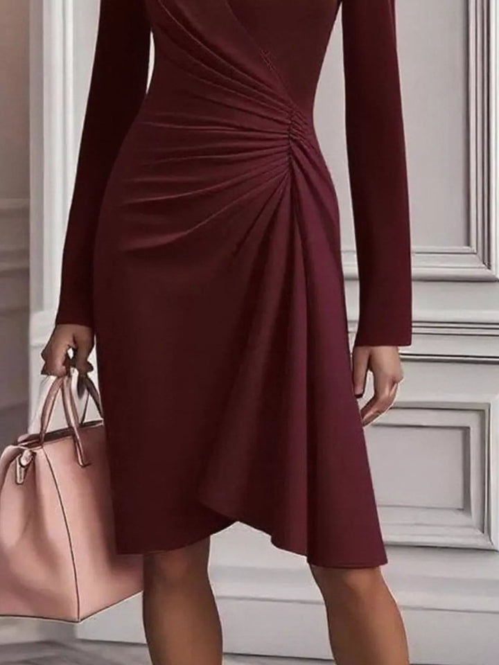 Front Ruched V-Neck Dress featuring sculpted front ruching, elegant V neckline, long fitted sleeves, and sleek body-contouring silhouette.