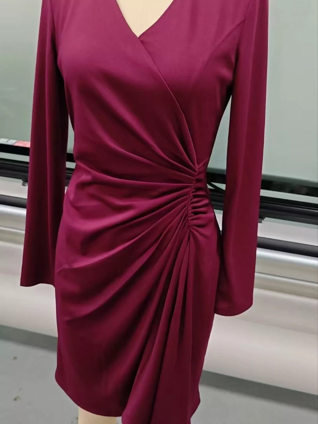 Front Ruched V-Neck Dress featuring sculpted front ruching, elegant V neckline, long fitted sleeves, and sleek body-contouring silhouette.