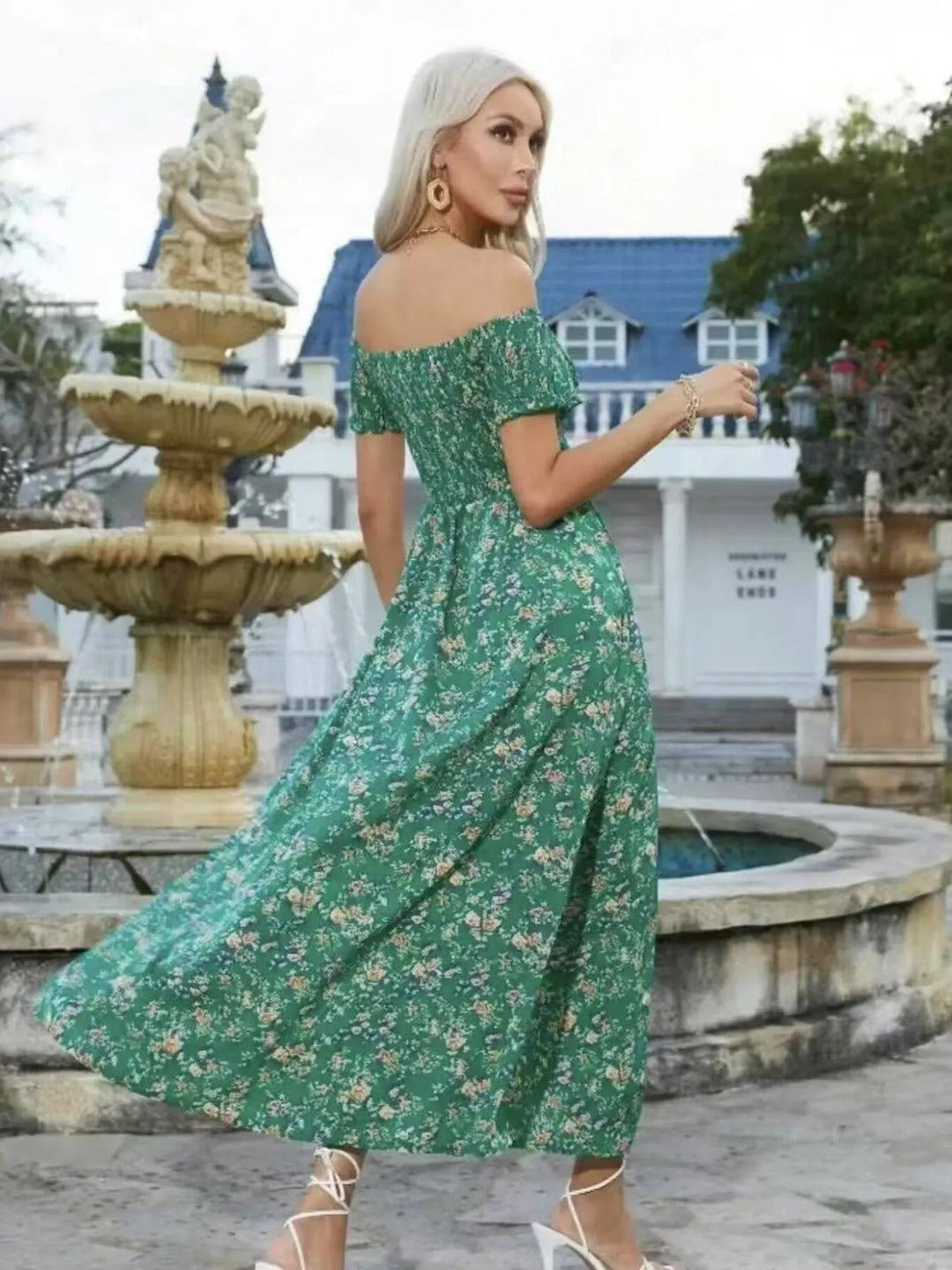 Plus Size Off-Shoulder Floral Dress with smocked neckline, side slit, and flowing midi silhouette in soft floral print