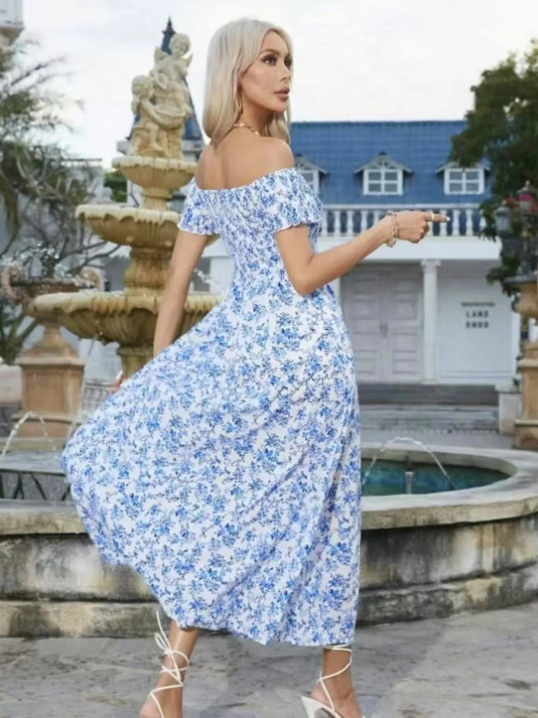 Plus Size Off-Shoulder Floral Dress with smocked neckline, side slit, and flowing midi silhouette in soft floral print