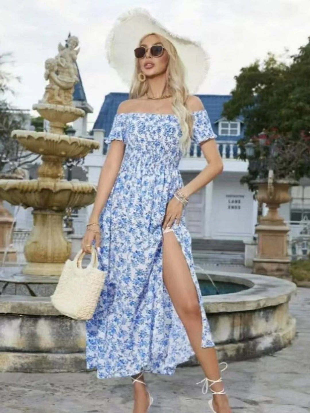 Plus Size Off-Shoulder Floral Dress with smocked neckline, side slit, and flowing midi silhouette in soft floral print
