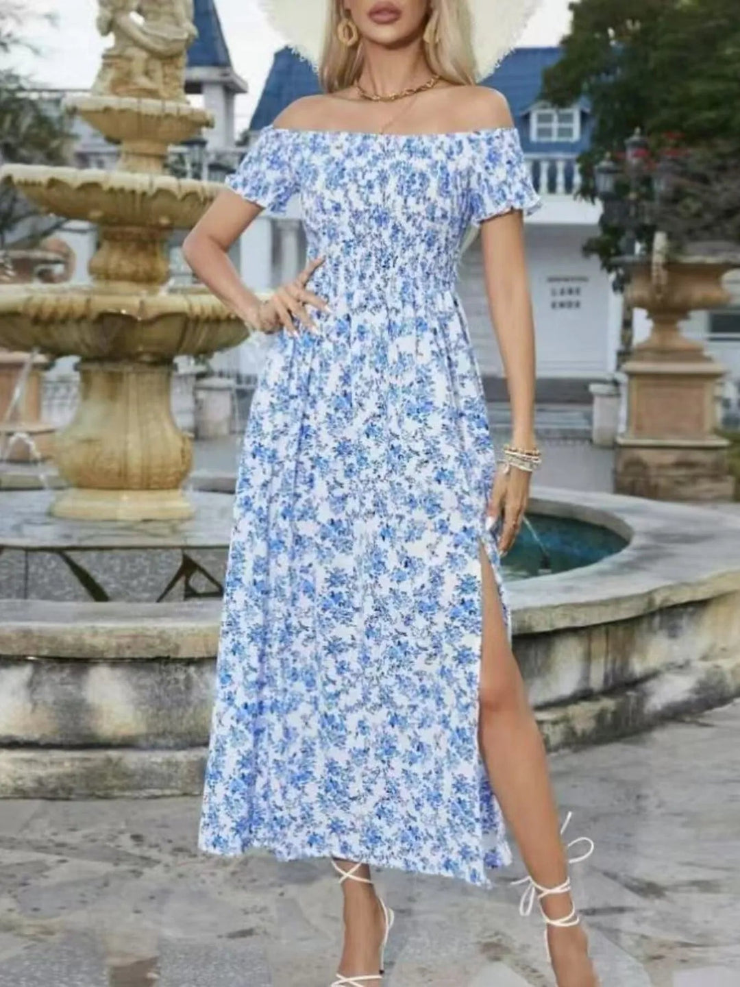 Plus Size Off-Shoulder Floral Dress with smocked neckline, side slit, and flowing midi silhouette in soft floral print