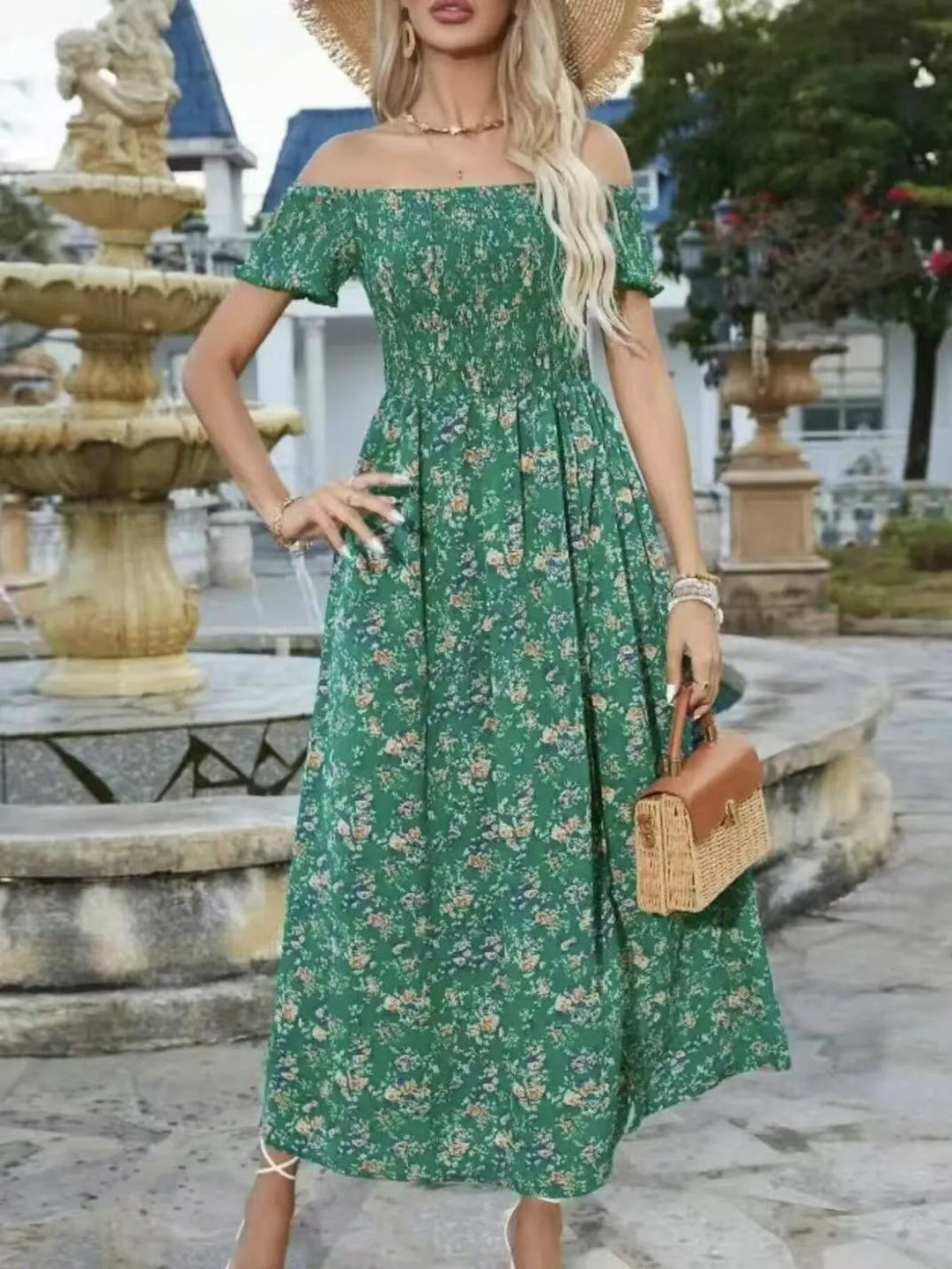 Plus Size Off-Shoulder Floral Dress with smocked neckline, side slit, and flowing midi silhouette in soft floral print