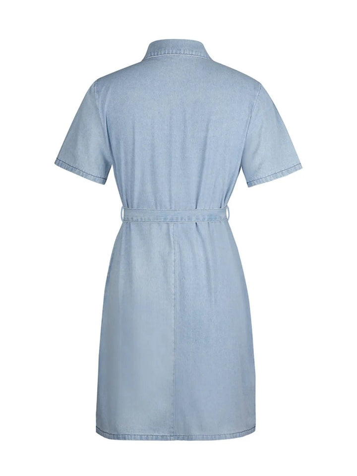 Plus Size Zip Front Denim Dress with short sleeves, adjustable tie waist, functional pockets, and flattering structured silhouette