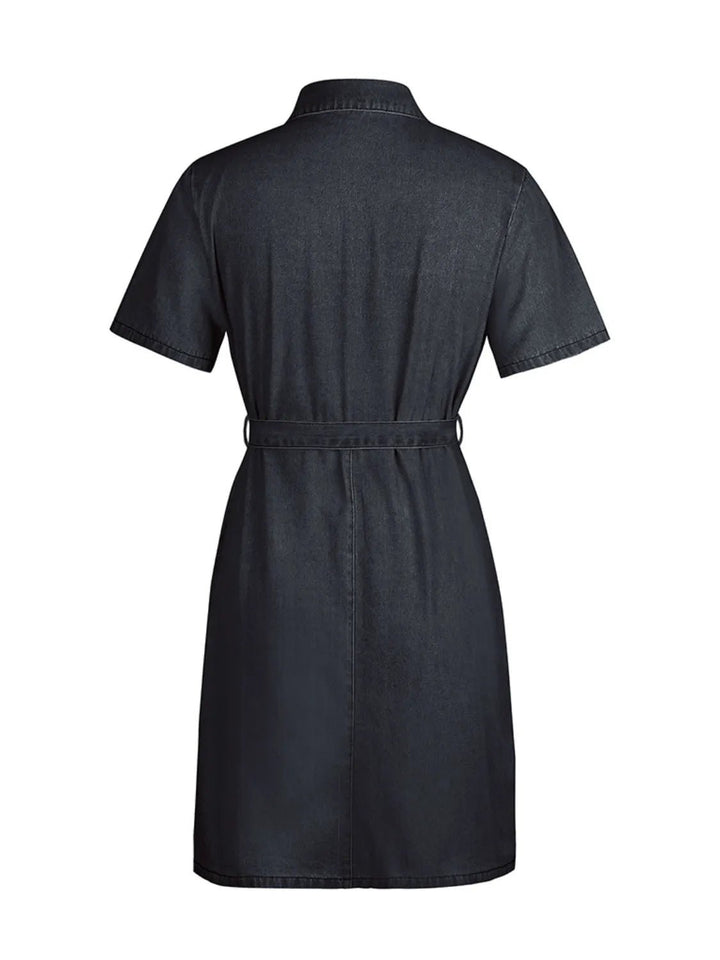 Plus Size Zip Front Denim Dress with short sleeves, adjustable tie waist, functional pockets, and flattering structured silhouette