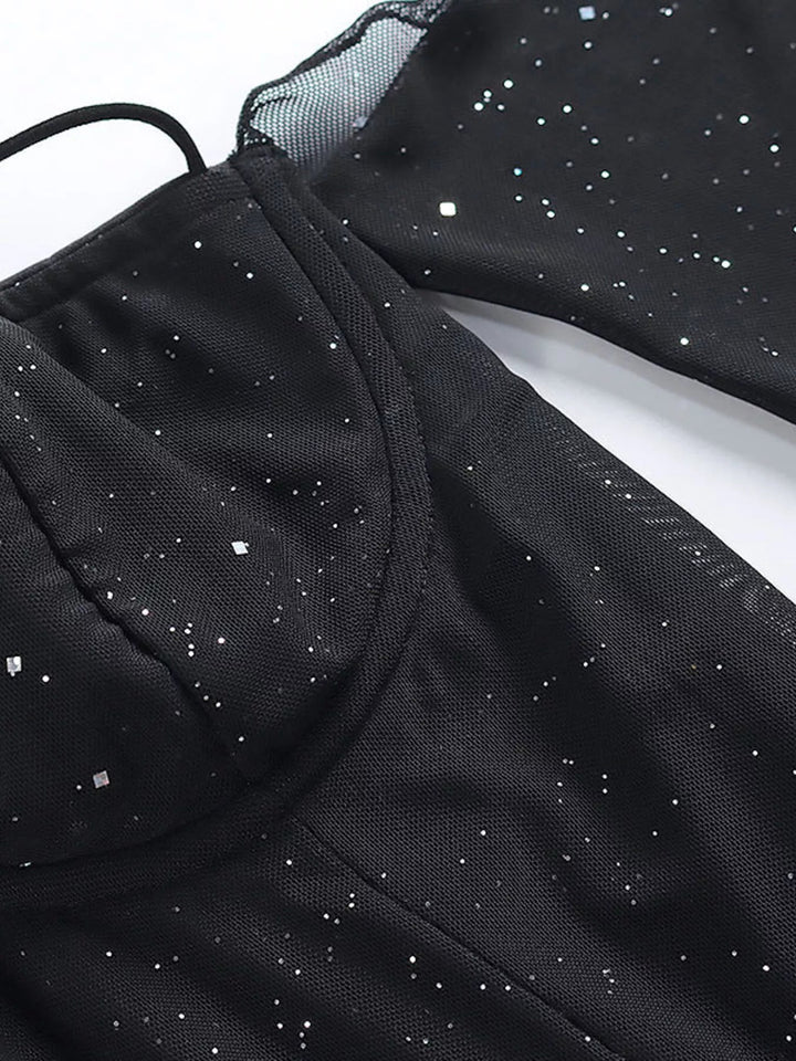 Glitter Mini Dress Sleeves with sheer long sleeves, side split detail, body-contouring mini silhouette, and refined shimmering fabric.