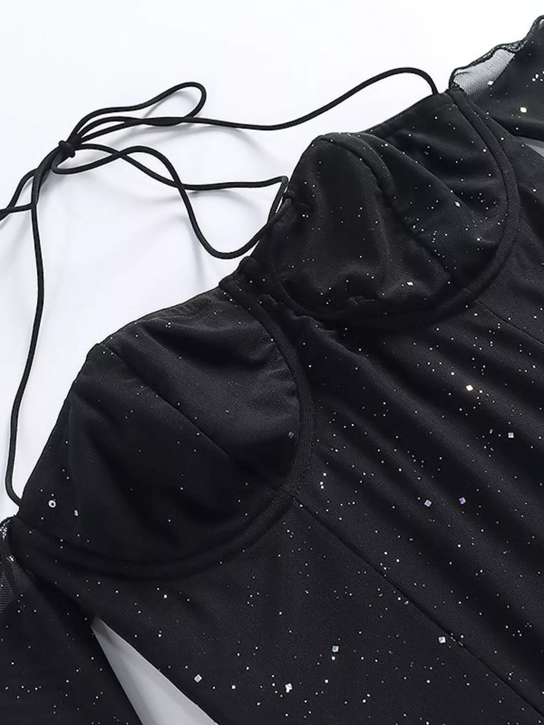 Glitter Mini Dress Sleeves with sheer long sleeves, side split detail, body-contouring mini silhouette, and refined shimmering fabric.