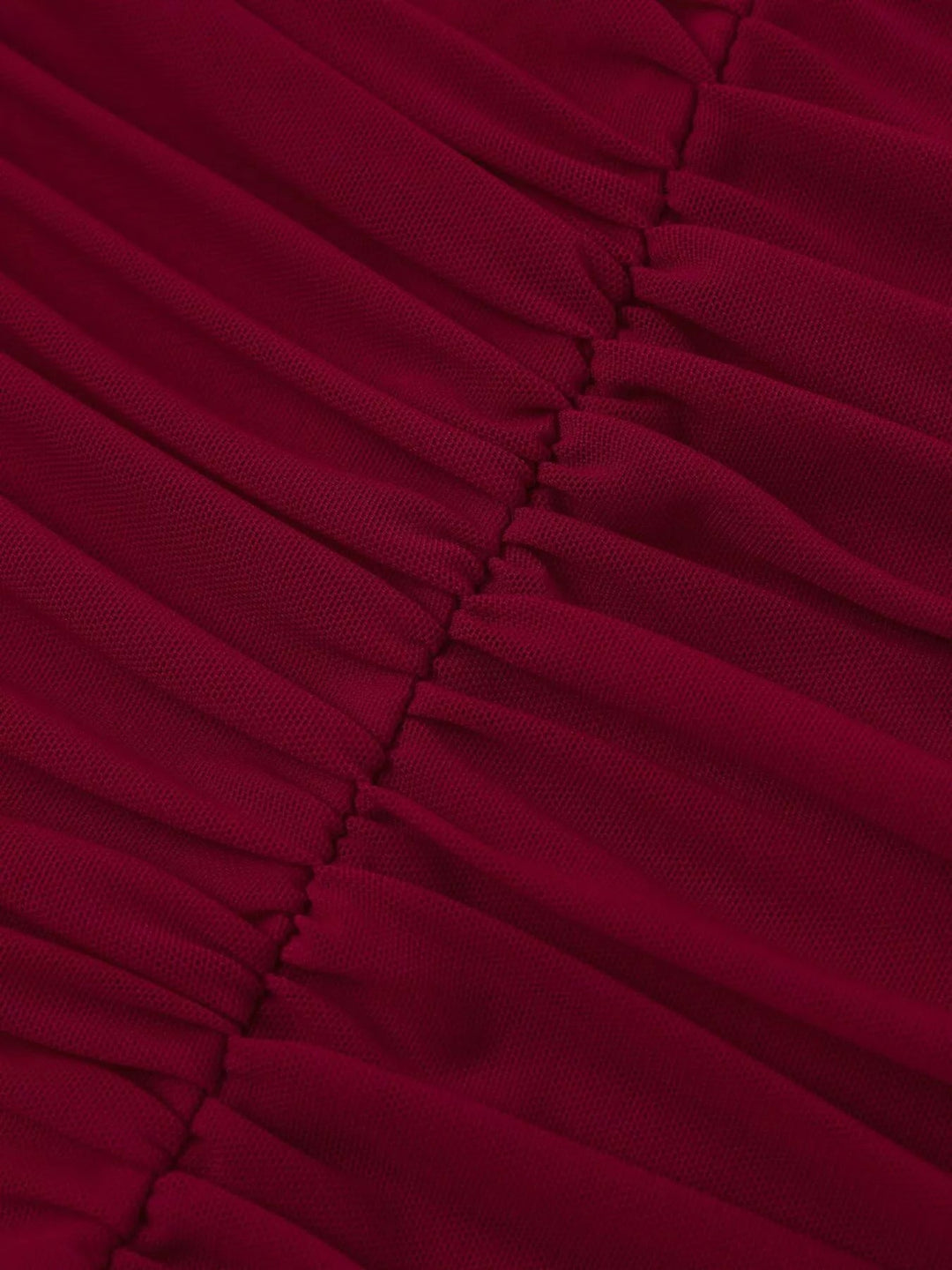 Halter Neck Ruched Slit Dress featuring sculpted ruched bodice, sheer mesh detail, high side slit, adjustable waist tie, and fitted floor-length maxi silhouette.