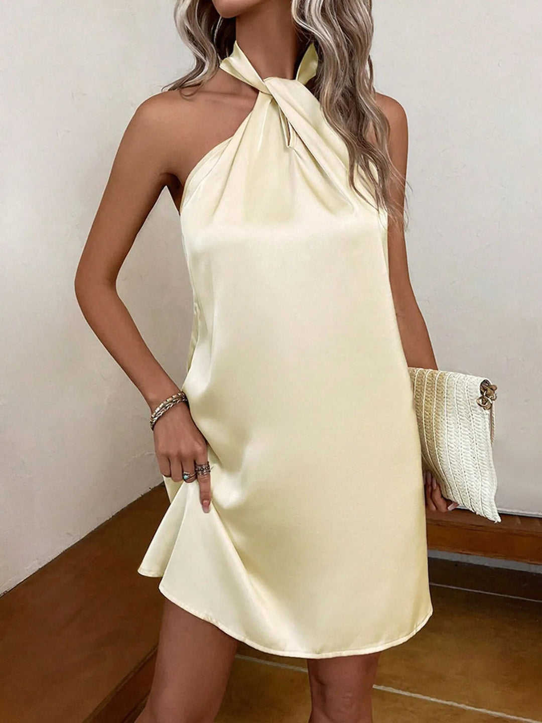Halter Neck Satin Dress with twisted bodice detail, zip-up back closure, and sleek mini silhouette in smooth satin fabric