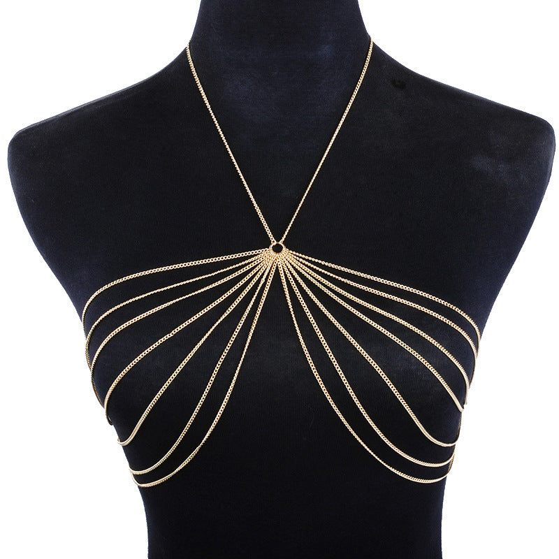 Metal body chain necklace for women displayed on a mannequin, featuring a unique, elegant design in gold color.