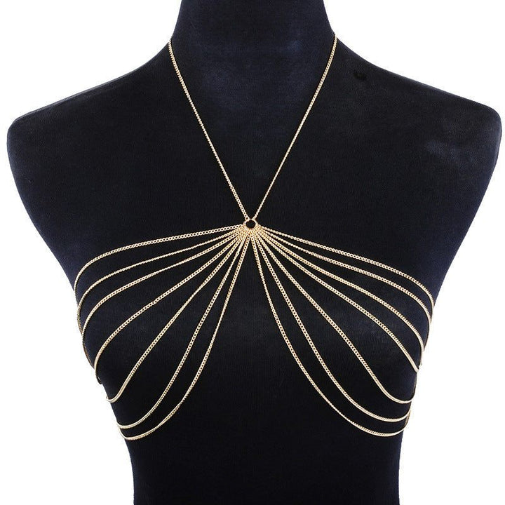 Metal body chain necklace for women displayed on a mannequin, featuring a unique, elegant design in gold color.