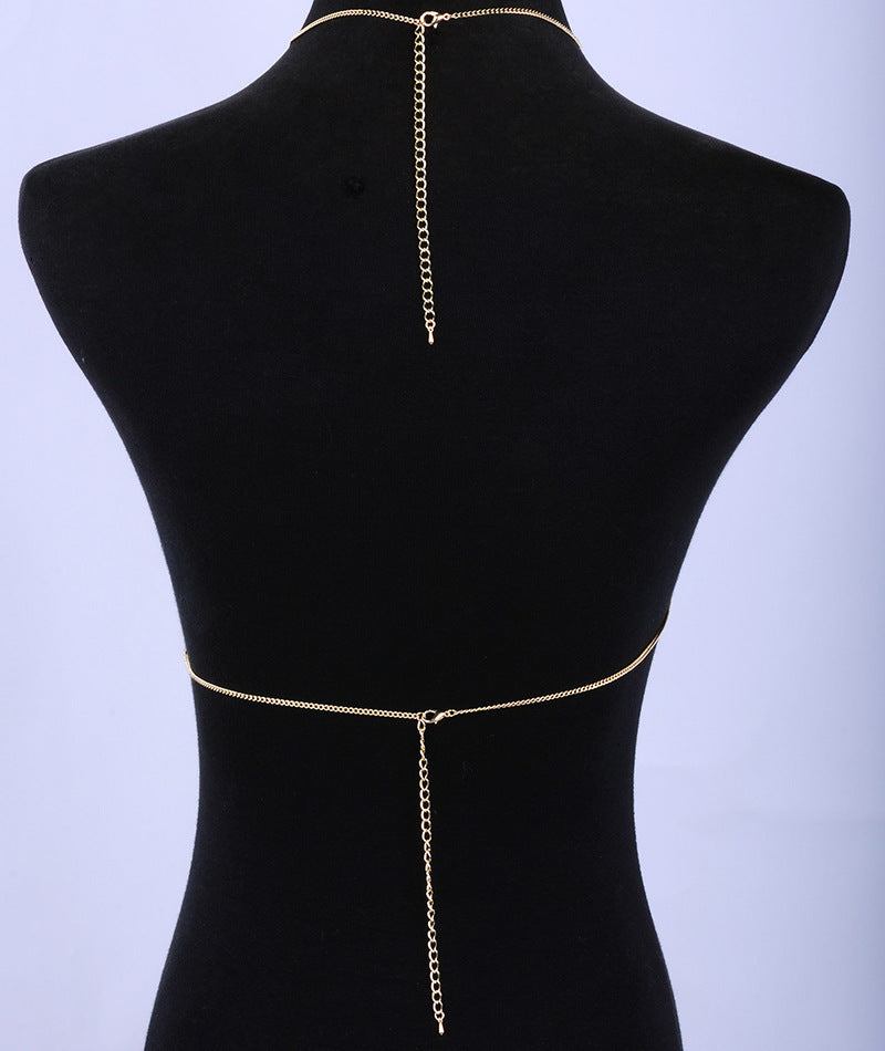 Metal body chain necklace for women displayed on a mannequin, featuring a sleek design in gold.