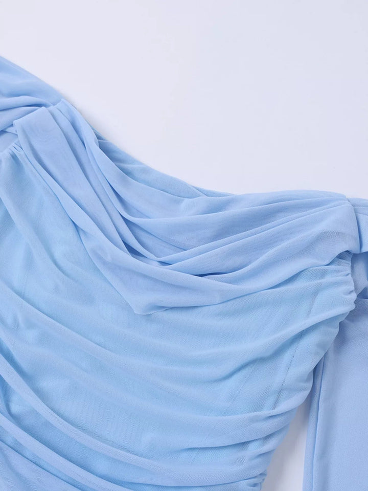 Off-Shoulder Ruched Mermaid Dress with fitted ruched bodice and elegant mermaid flare.