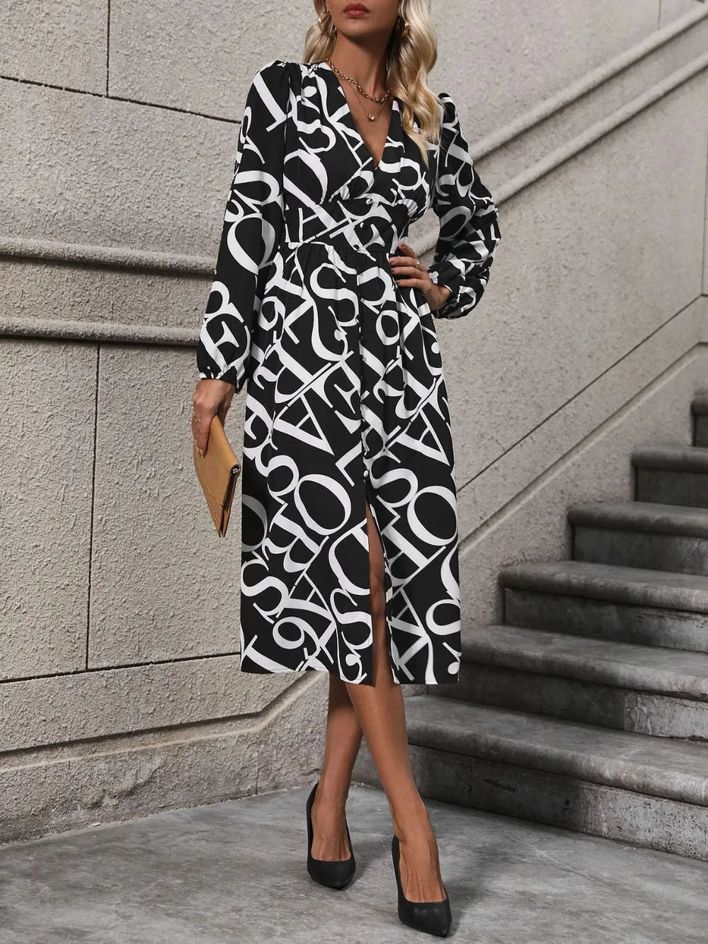 Printed V-Neck Midi Dress with long sleeves, buttoned front detail, and flowing midi-length silhouette in opaque fabric.