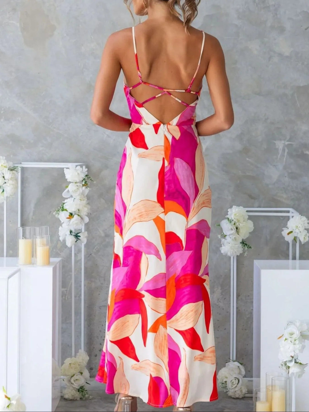 Printed Backless Maxi Dress with sleeveless design, flowing full-length silhouette, and elegant open back detail
