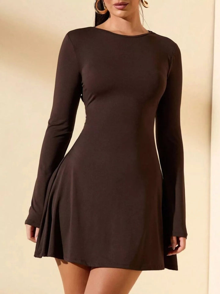 Round Neck Long Sleeve Dress with tied waist detail, fitted mini silhouette, and sleek long sleeves for a polished feminine look.