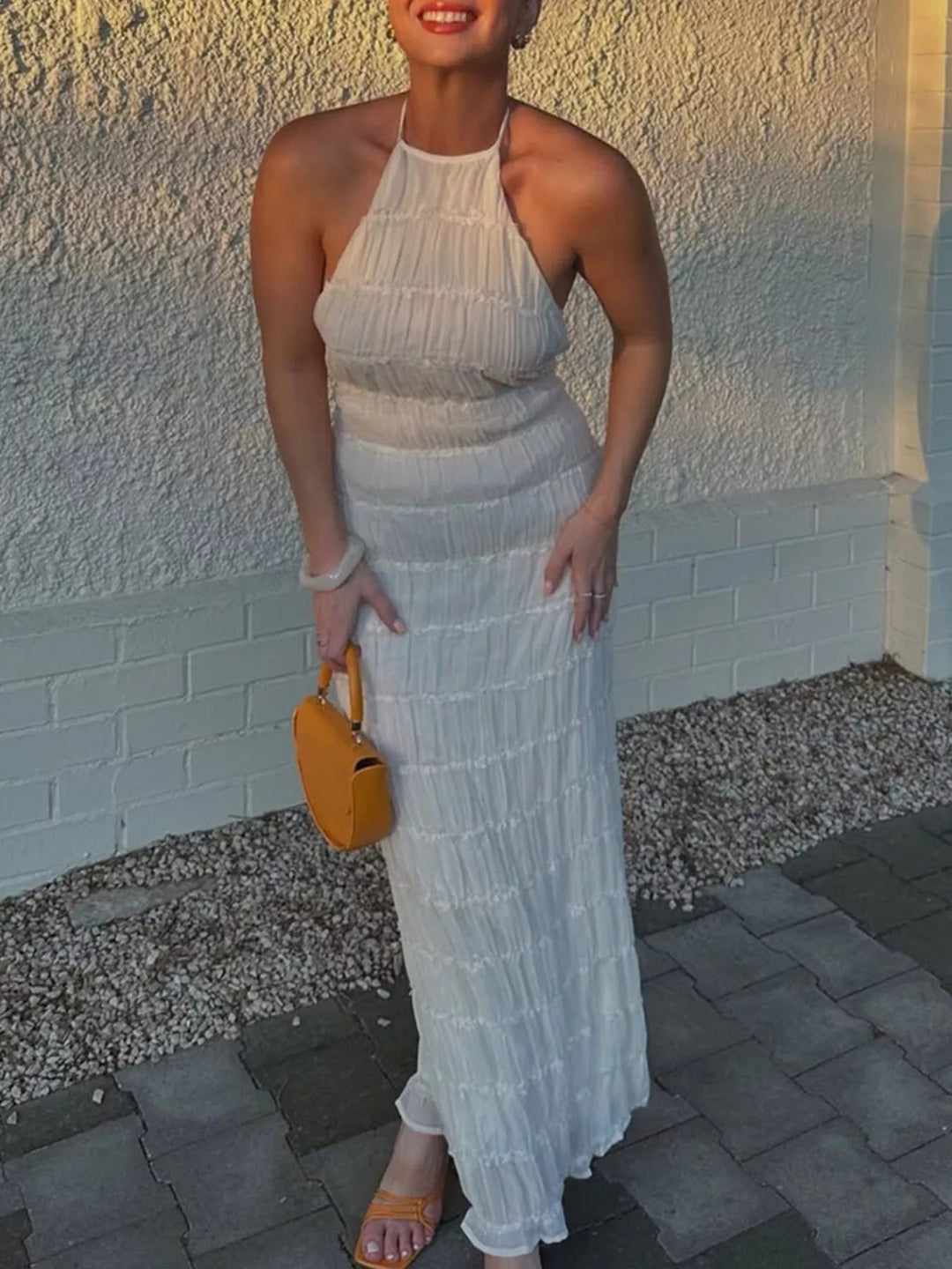 Ruched Halter Maxi Dress with tie neckline, smocked waist detail, flowing full-length skirt, and elegant draped silhouette.