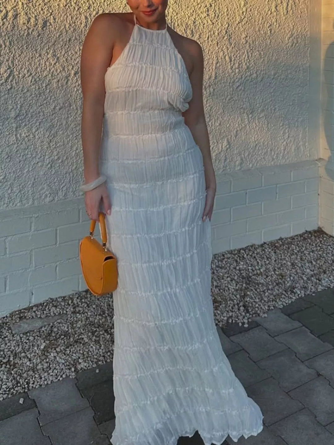 Ruched Halter Maxi Dress with tie neckline, smocked waist detail, flowing full-length skirt, and elegant draped silhouette.