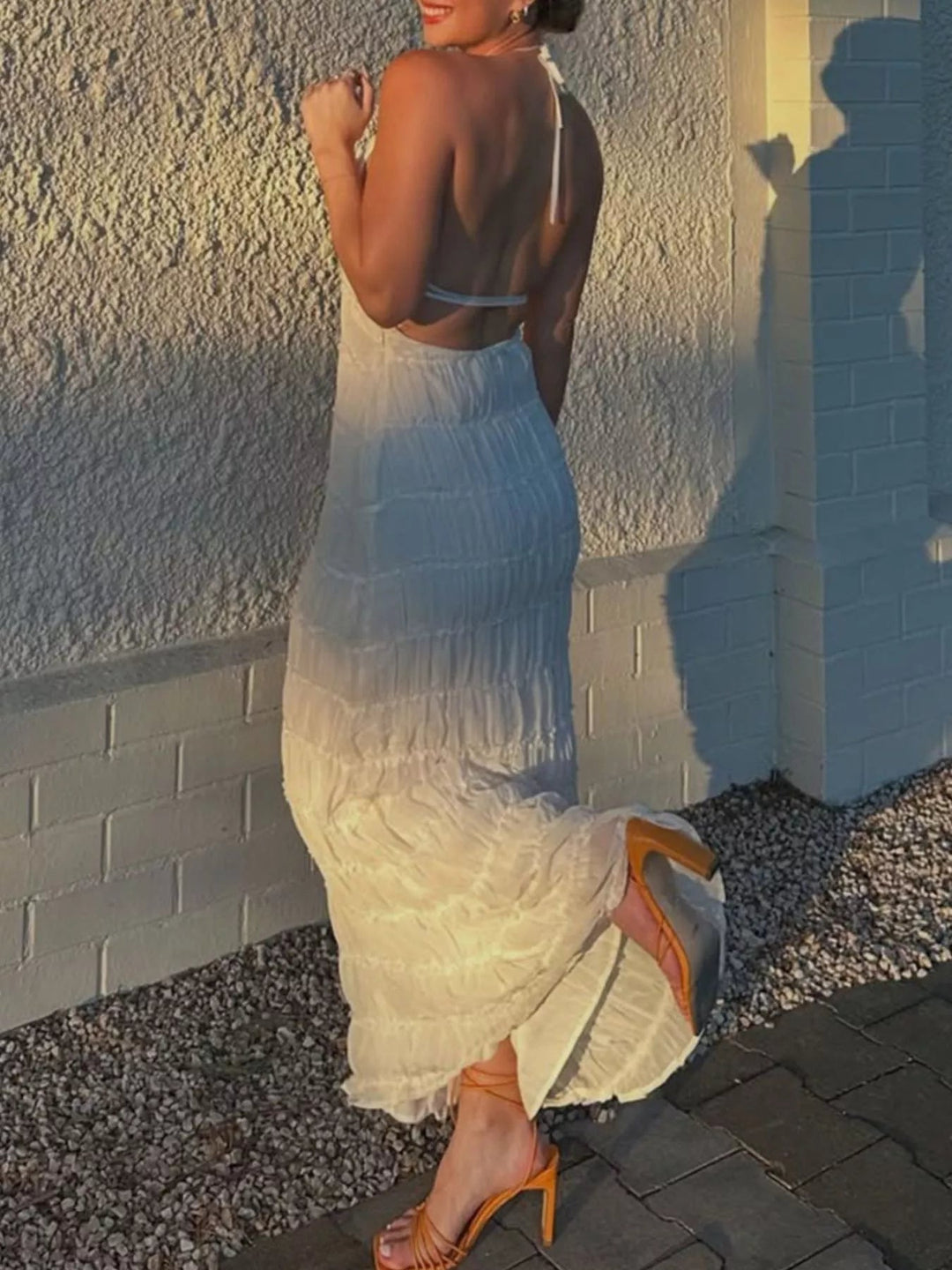 Ruched Halter Maxi Dress with tie neckline, smocked waist detail, flowing full-length skirt, and elegant draped silhouette.