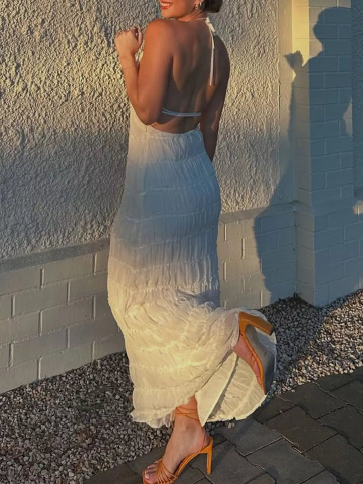 Ruched Halter Maxi Dress with tie neckline, smocked waist detail, flowing full-length skirt, and elegant draped silhouette.