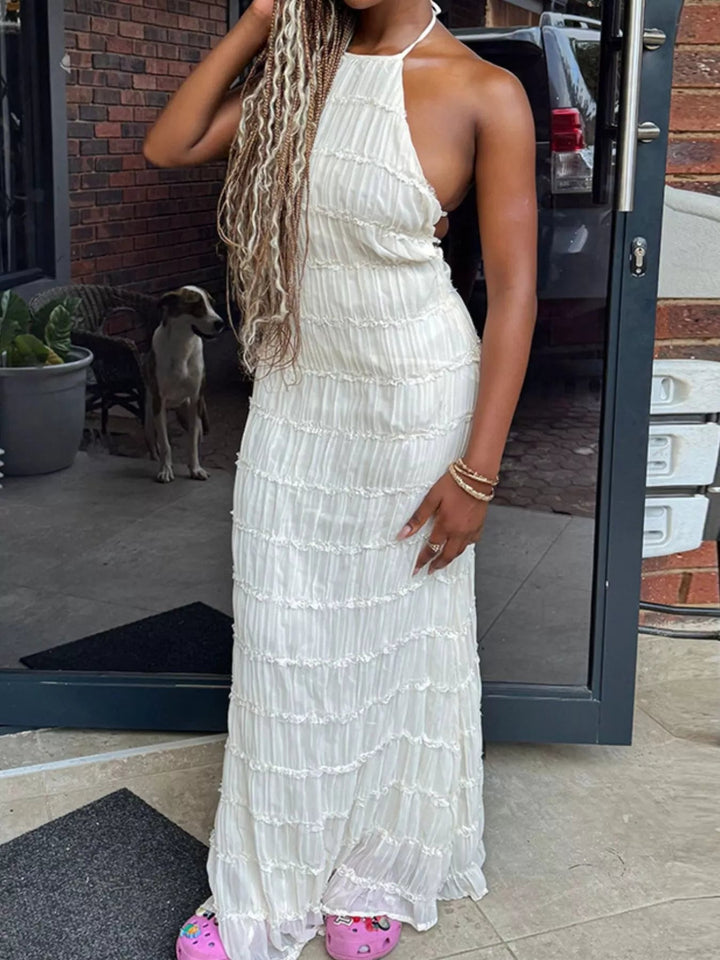 Ruched Halter Maxi Dress with tie neckline, smocked waist detail, flowing full-length skirt, and elegant draped silhouette.