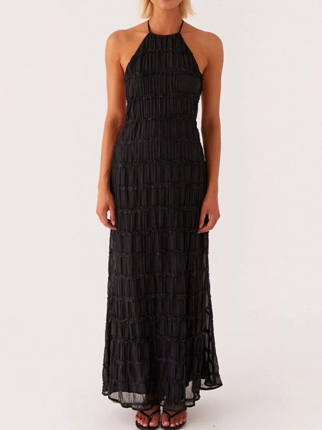 Ruched Halter Maxi Dress with tie neckline, smocked waist detail, flowing full-length skirt, and elegant draped silhouette.