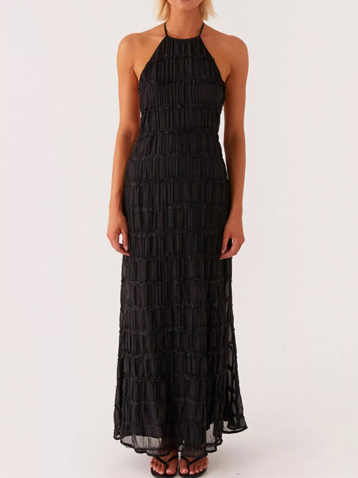 Ruched Halter Maxi Dress with tie neckline, smocked waist detail, flowing full-length skirt, and elegant draped silhouette.